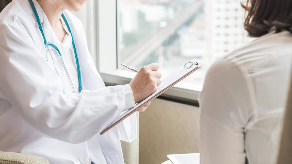 A primary care provider talking to a patient in South Riding, VA