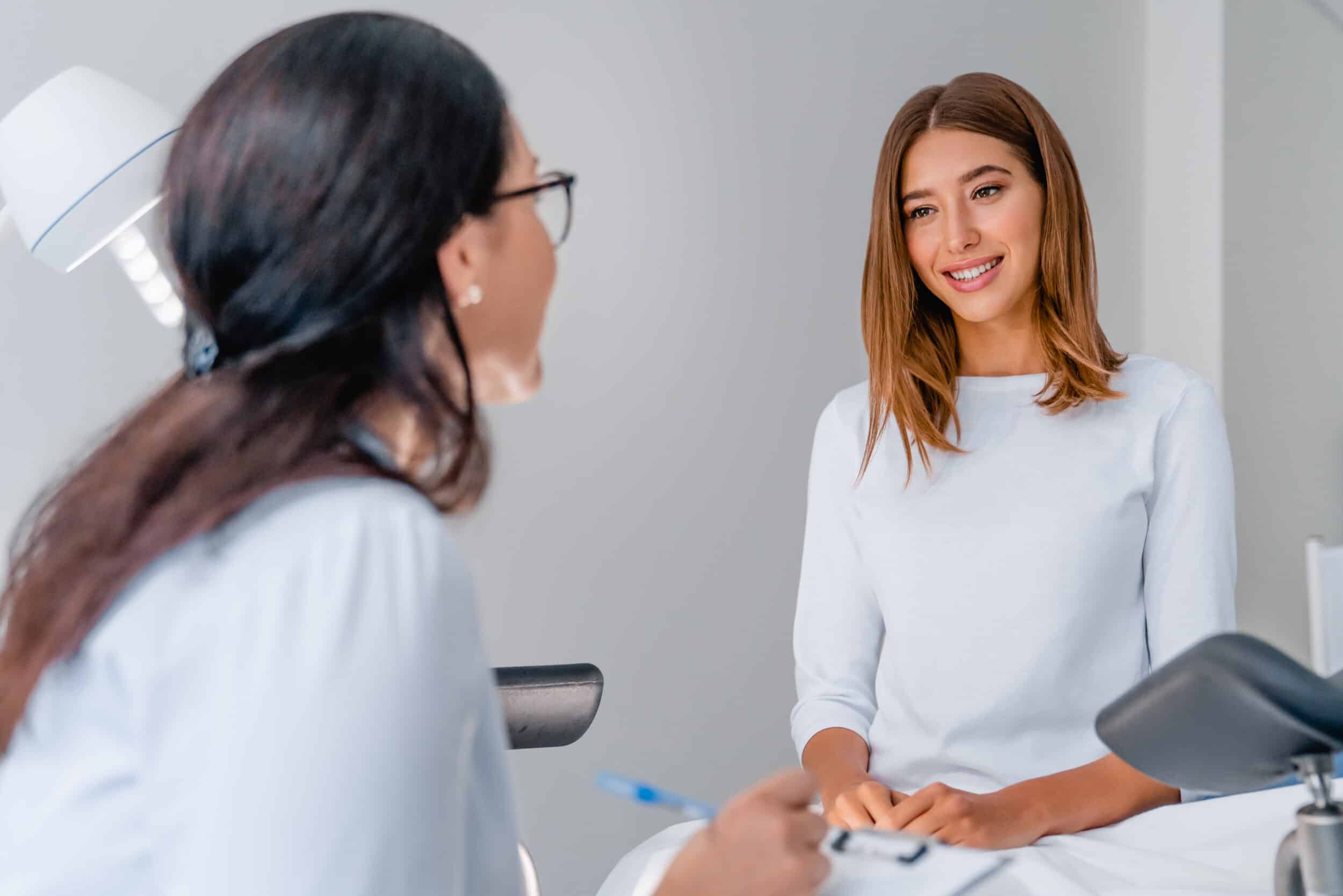 A concierge doctor talking to a patient with a chronic illness
