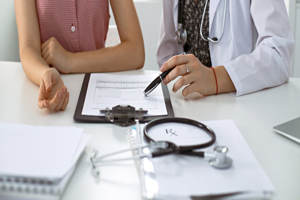 A family medicine practitioner discussing a patient care plan