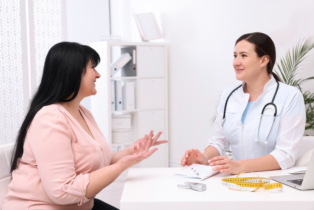 Overweight woman having a consultation with her doctor about semaglutide for weight loss. Semaglutide Fairfax VA