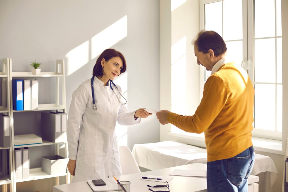 Friendly,Smiling,Female,Doctor,Gives,A,Mature,Male,Patient,A Extended Access / Personalized Care in Fairfax, South Riding, Merrifield, & Tysons, VA